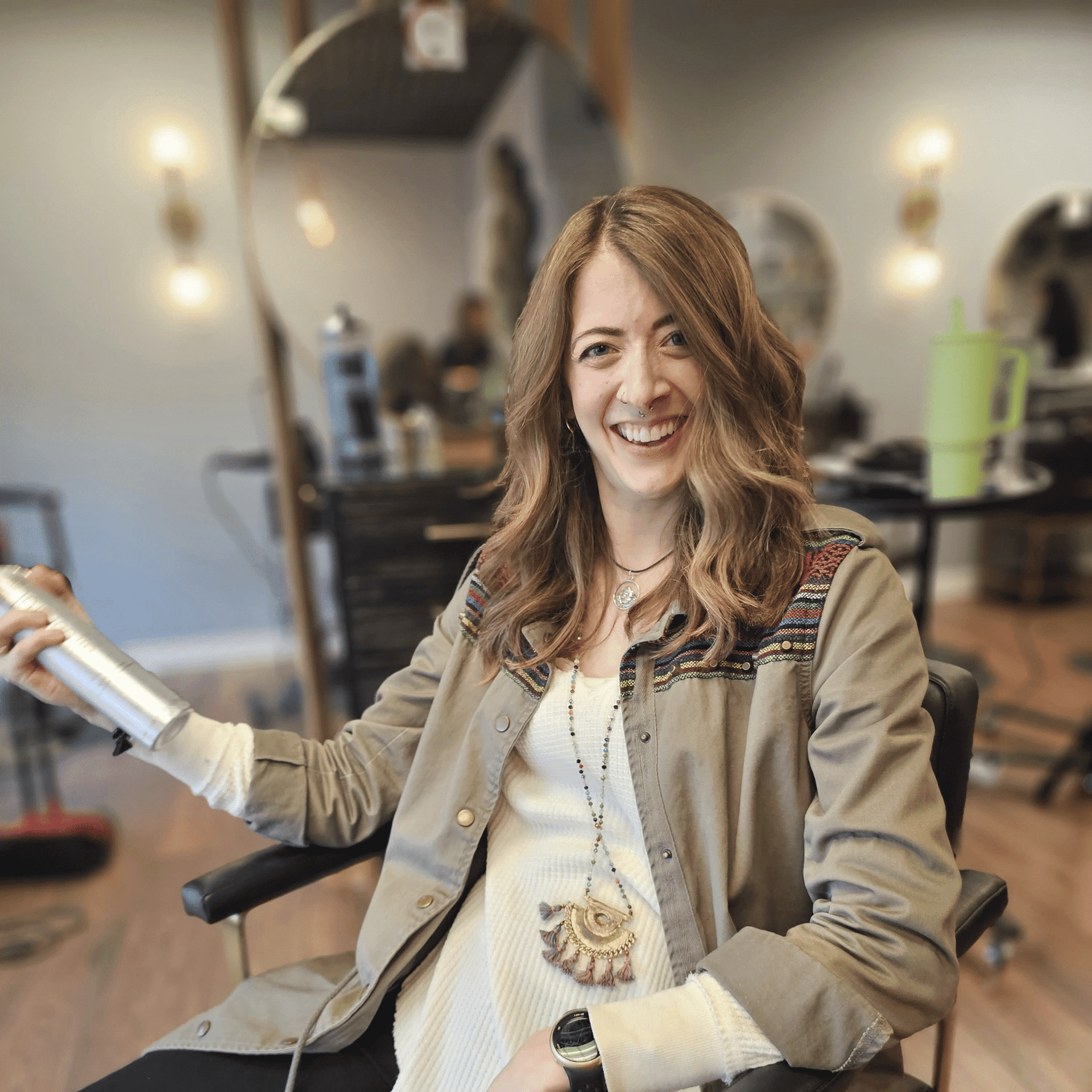 Portrait of Sidney Stotsky, a professional stylist at Salon Enso, showcasing their expertise and style.