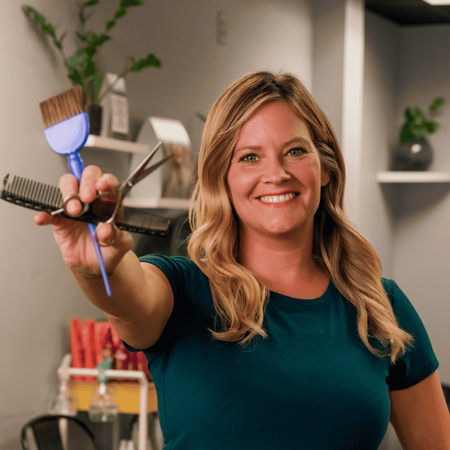 Portrait of Lisa Lewis, a professional stylist at Salon Enso, showcasing their expertise and style.
