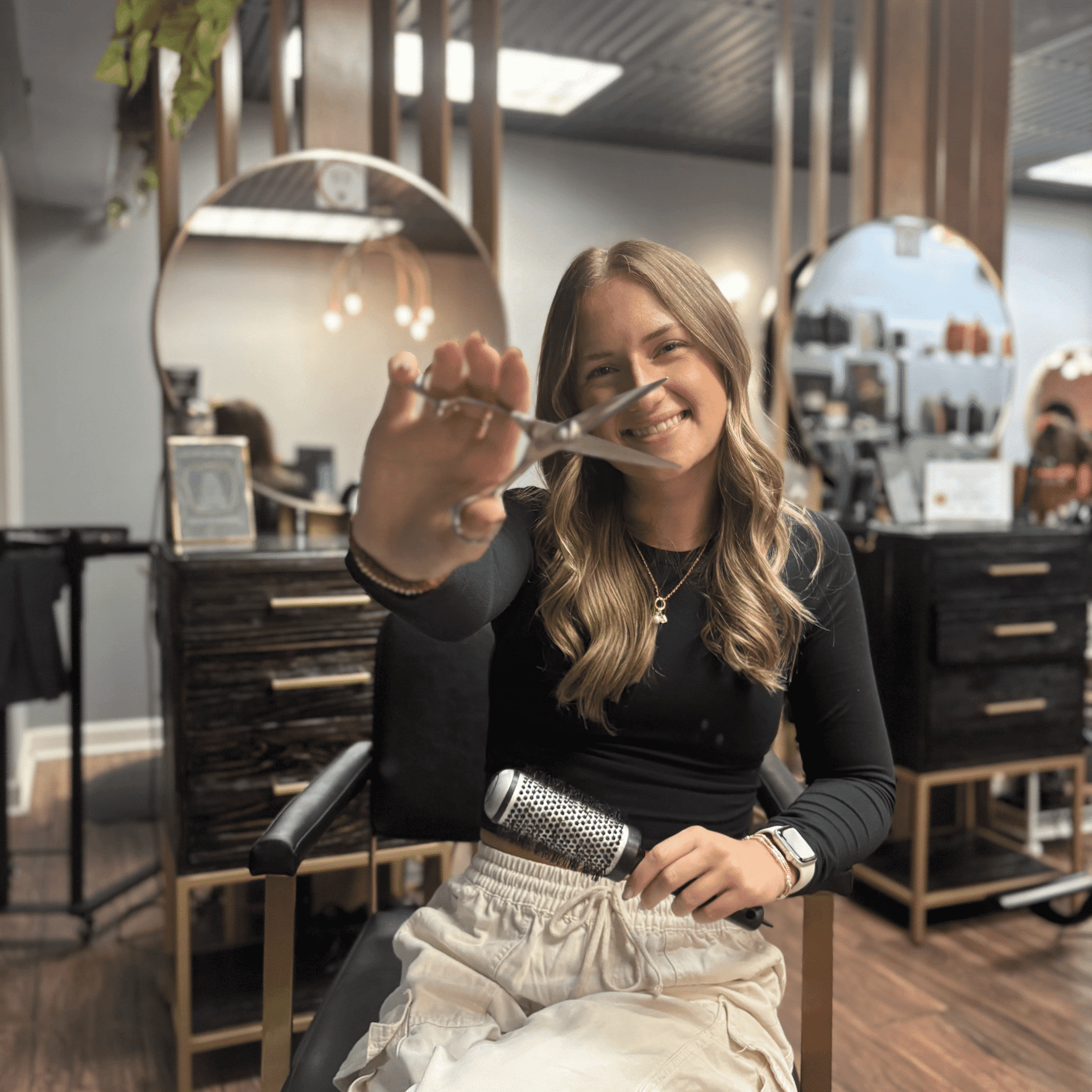 Portrait of Hailey Nelson, a professional stylist at Salon Enso, showcasing their expertise and style.