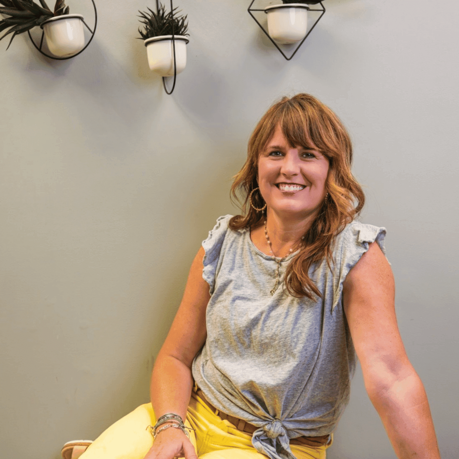 Portrait of Susan Royer, a professional stylist at Salon Enso, showcasing their expertise and style.