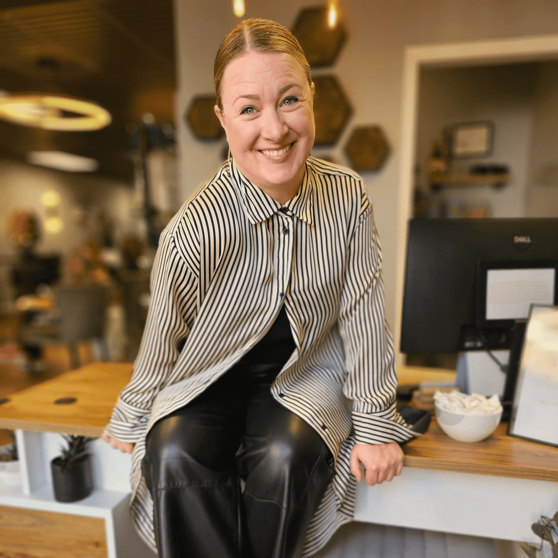 Portrait of Darcy Taylor, a professional stylist at Salon Enso, showcasing their expertise and style.